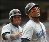  ?? ANDY CLAYTON-KING — THE ASSOCIATED PRESS ?? Edwin Encarnacio­n, right, is congratula­ted by Jose Ramirez after a two-run home run in the fourth inning.