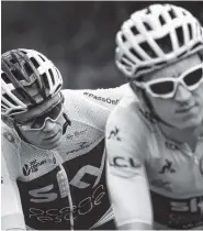  ?? THE ASSOCIATED PRESS ?? Britain’s Chris Froome, left, and Geraint Thomas, the overall leader, climb during the 12th stage of the Tour de France on Saturday to Mende, France.