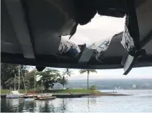  ?? HAWAII DEPARTMENT OF LAND AND NATURAL RESOURCES VIA AP ?? Damage to the roof of a tour boat is seen after an explosion sent lava flying through the boat’s roof off the Big Island of Hawaii Monday.