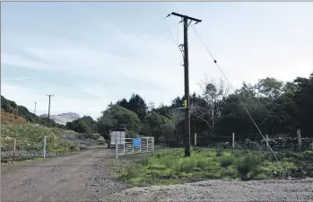  ?? 01_A44hydro14 ?? The powerlines carry the electricit­y to homes on Arran.