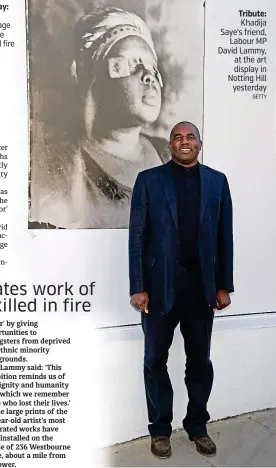  ?? GETTY ?? Tribute:
Khadija Saye’s friend, Labour MP David Lammy, at the art display in Notting Hill yesterday