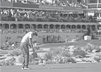  ?? CHERYL EVANS/THE REPUBLIC ?? Bubba Watson putts on the 16th green during Round 2 of the WM Phoenix Open at TPC Scottsdale on Feb. 11, 2022.