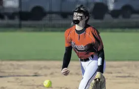  ??  ?? Munster’s Mady Kindy pitches against Kankakee Valley on Friday.