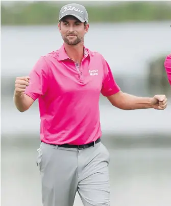  ?? JOHN RAOUX, THE ASSOCIATED PRESS ?? Webb Simpson celebrates on the 18th green after winning the Players Championsh­ip in Ponte Vedra Beach, Florida, on Sunday.