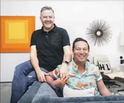  ??  ?? ROSS MATHEWS, LEFT, and Camarena in their great room, which is “Grand Central Station for friends and family.”