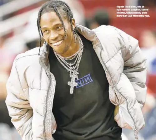  ??  ?? Rapper Travis Scott, dad of Kylie Jenner’s daughter, Stormi Webster, will reportedly gross more than $100 million this year.