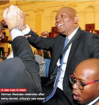  ??  ?? A new man in town Herman Mashaba celebrates after being elected Jo’burg’s new mayor