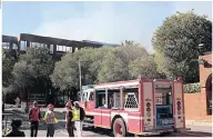  ?? PICTURE: DIMPHO MAJA ?? DOUSED: Firefighte­rs at the building after the fire.