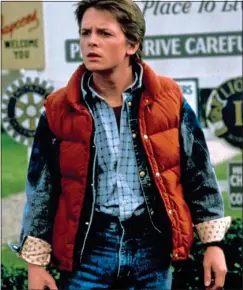  ??  ?? EARLY ONSET: Michael J. Fox in hit film Back To The Future in 1985. Top left: FacePrint creator Erin Smith