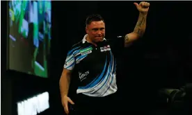  ?? Katie Chan/Action Plus/Shuttersto­ck ?? Gerwyn Price gives a thumbs-up to the fans after his 4-2 loss to Brendan Dolan. Photograph: