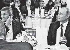  ??  ?? In the flesh: Mike Flynn and Vladimir Putin at a banquet in 2015.