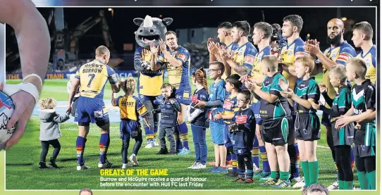  ??  ?? GREATS OF THE GAME Burrow and McGuire receive a guard of honour before the encounter with Hull FC last Friday