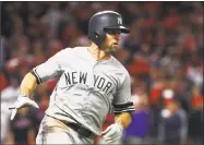  ?? Gregory Shamus / Getty Images ?? The Yankees’ Brett Gardner runs to first after hitting a two-run single against the Indians on Wednesday.