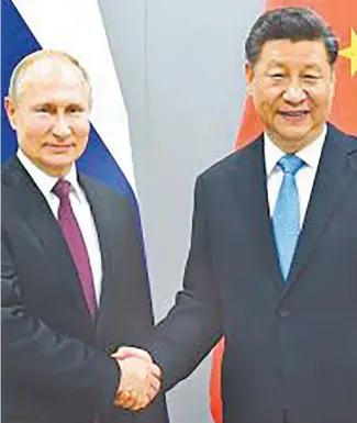  ?? ?? Vladimir Putin y Xi Jinping.