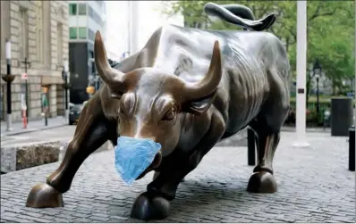  ?? (AFP) ?? File photo of the Charging Bull in the Financial District of Manhattan in New York.