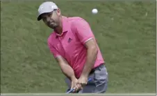  ??  ?? Sergio Garcia chips onto the second green during The Players Championsh­ip golf tournament Sunday in Ponte Vedra Beach, Fla. AP PHOTO