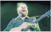  ?? AP FILE ?? The late Scott Hutchison of Scottish indie rockers Frightened Rabbit has a powerful moment in “Song of Back and Neck,” performing the poignant “Swim Until You Can’t See Land.”