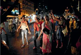  ?? AP ?? Residents celebrate in Kinshasa, Congo, after learning that opposition presidenti­al candidate Felix Tshisekedi had been declared the winner of the elections.