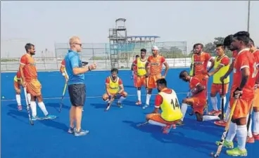  ?? HOCKEY INDIA ?? Chief coach Sjoerd Marijne (left) discussing plan with players during a training session in Bhubneswar on Thursday.