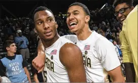  ?? JOHN AMIS / AP ?? Former Tech guard Josh Okogie (5), with teammate Justin Moore last season, was selected by Minnesota with the 20th pick in the NBA draft Thursday.