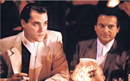  ??  ?? A curdled atmosphere: Henry (Ray Liotta) and Tommy (Joe Pesci) in the Bamboo Lounge