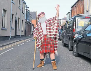  ?? Picture: Dougie Nicolson. ?? Arbroath great-grandmothe­r May Smith in one of the fancy dress costumes which have been amusing people.