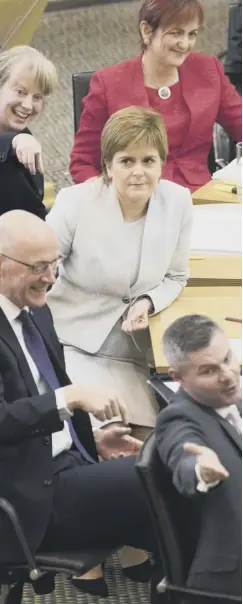  ??  ?? 0 The SNP’S front bench reacts with glee after Nicla Sturgeon’s blast against Labour leadership contender Anas Sarwar