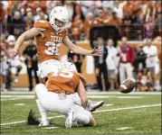  ?? JAY JANNER / AMERICAN-STATESMAN ?? Senior kicker Mitchell Becker (above, attempting a field goal in 2016) might see his first game action this season when Texas faces Kansas.