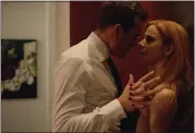  ?? USA ?? Harvey (played by Gabriel Macht, left) and Donna (Sarah Rafferty) are the new power couple on “Suits,” as the USA series kicks off its ninth and final season Wednesday.