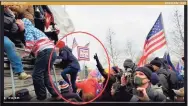  ?? Federal Court Records ?? An image from a video that federal investigat­ors said showed Carla Krzywicki and Jean Lavin climbing an upturned bike rack to get over a wall near the U.S. Capitol, federal court records show.