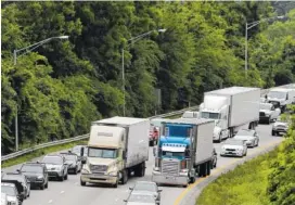  ?? STAFF PHOTO BY ERIN O. SMITH ?? Stop-and-go traffic makes its way down Interstate 24 West near the Old Ringgold Road overpass Thursday.