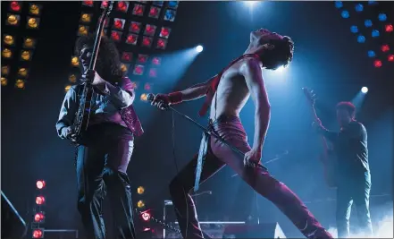  ?? TWENTIETH CENTURY FOX ?? “Bohemian Rhapsody” has its share of detractors and controvers­y, but Rami Malek’s portrayal of Freddie Mercury, center, has been praised and he could be the front-runner for best actor.