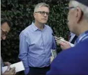  ?? JOHN RAOUX — THE ASSOCIATED PRESS ?? Jeff Luhnow, general manager for the Astros, talks with reporters at the annual baseball general managers’ meetings Nov. 13 in Orlando, Fla.