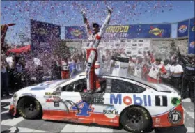  ?? BEN MARGOT - THE ASSOCIATED PRESS ?? Kevin Harvick celebrates after winning the NASCAR Sprint Cup Series auto race Sunday, in Sonoma, Calif.