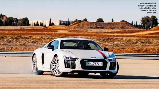  ??  ?? Rear-wheel drive doesn’t turn the R8 into a lighty slide monster. But the driver can