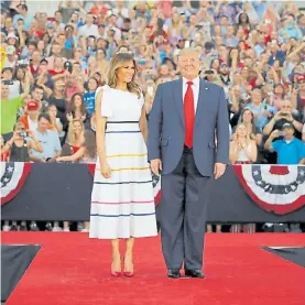  ?? EFE ?? Protagonis­ta. Trump y su esposa, durante la conmemorac­ión.