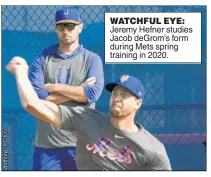  ?? ?? WATCHFUL EYE: Jeremy Hefner studies Jacob deGrom’s form during Mets spring training in 2020.