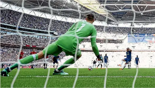  ?? GETTY IMAGES ?? Eden Hazard scores from the penalty spot for Chelsea, the only goal in their FA Cup final win over Manchester United.