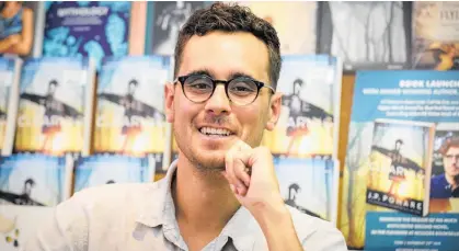  ?? Photos / Andrew Warner ?? Pomare pictured at the launch of his book In the Clearing at McLeods Bookseller­s in Rotorua in 2020.