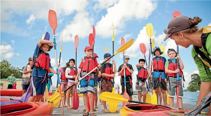  ?? SUPPLIED ?? Children learn how to kayak at an Upper Harbour Local Board funded-event in Greenhithe. Now the local board wants to know if it should prioritise funding for similar events in the future.