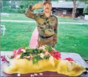  ?? INDIAN ARMY ?? ■ A soldier salutes during a memorial service for Dutch, an army dog who helped save many lives.