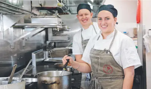  ?? Picture: STEWART McLEAN ?? Alec Stemmler, 22 and Liberty Smith, 19, of the Shangri-La hotel are award winning young chefs in Cairns. Mr Stemmler is also chairman of the Young Chefs Club.