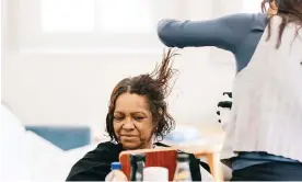  ?? Photograph: Jacqueline Jane van Grootel/Short Back & Sidewalks ?? Short Back and Sidewalks, which began in a Perth car park eight years ago, offer free haircuts for people experienci­ng homelessne­ss. It received $400,000 in Tuesday’s federal budget.