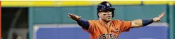  ?? AP ?? Astros second baseman Jose Altuve had three hits and a stolen base in the win.