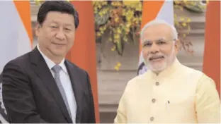  ??  ?? Prime Minister Narendra Modi (right) and Chinese President Xi Jinping