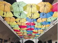  ??  ?? Colourful umbrellas are creatively suspended over an arcade in Kosice’s town centre, a medieval downtown with modern touches.