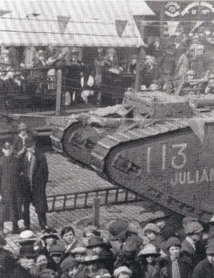  ??  ?? Crowds flock to see ‘Julian the Tank’, which also made a visit to Aberdare in 1918