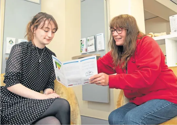  ?? ?? HELP AT HAND: Energy advisers Sophie Craig, left, and Lynn Brady at the Environmen­tal Network St Andrews Eco Hub. Picture by Kim Cessford.