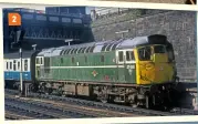  ?? ?? 2: Prior to the applicatio­n of Rail blue, many Class 27s gained full yellow ends and even TOPS numbers while still carrying green livery, as seen on 27001. This view was captured at Glasgow Queen Street in August 1974. COLOUR RAIL