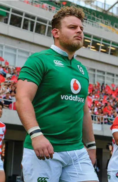  ?? SPORTSFILE ?? Finlay Bealham walks out in a different shade of green for Ireland’s game against Japan